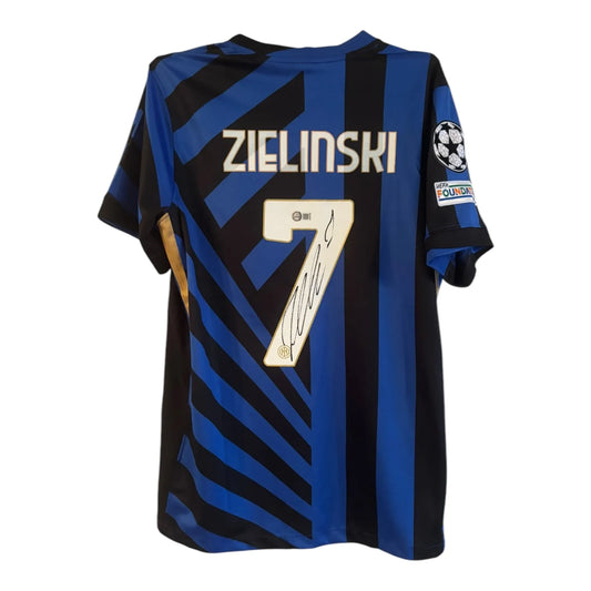 Signert Piotr Zieliński drakt